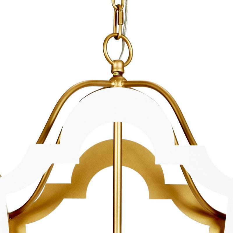 Gold and white metal lantern with hanging hook and glossy clear glass shade