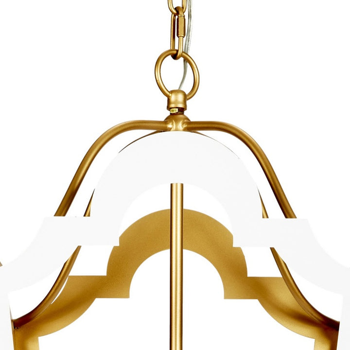 Gold and white metal lantern with hanging hook and glossy clear glass shade
