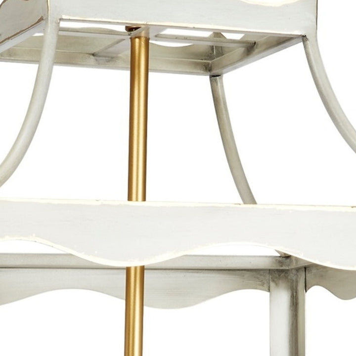 Cream metal lantern frame with gold center post and tiered top detail