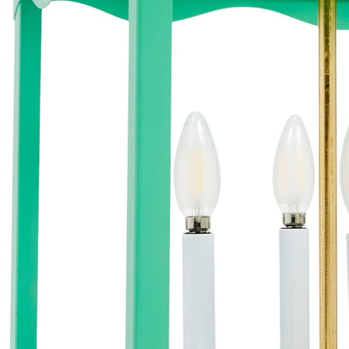 Sea green lantern with two white candle bulbs and gold vertical post