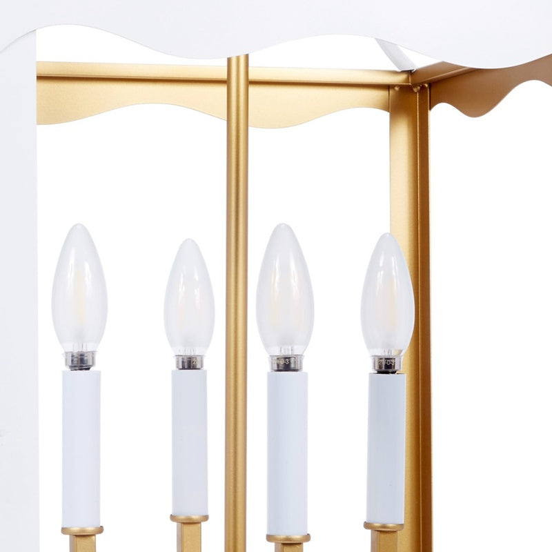 White metal four-light lantern with gold posts and four frosted bulb covers