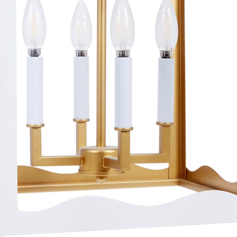White metal four-light lantern with gold base and four frosted bulbs
