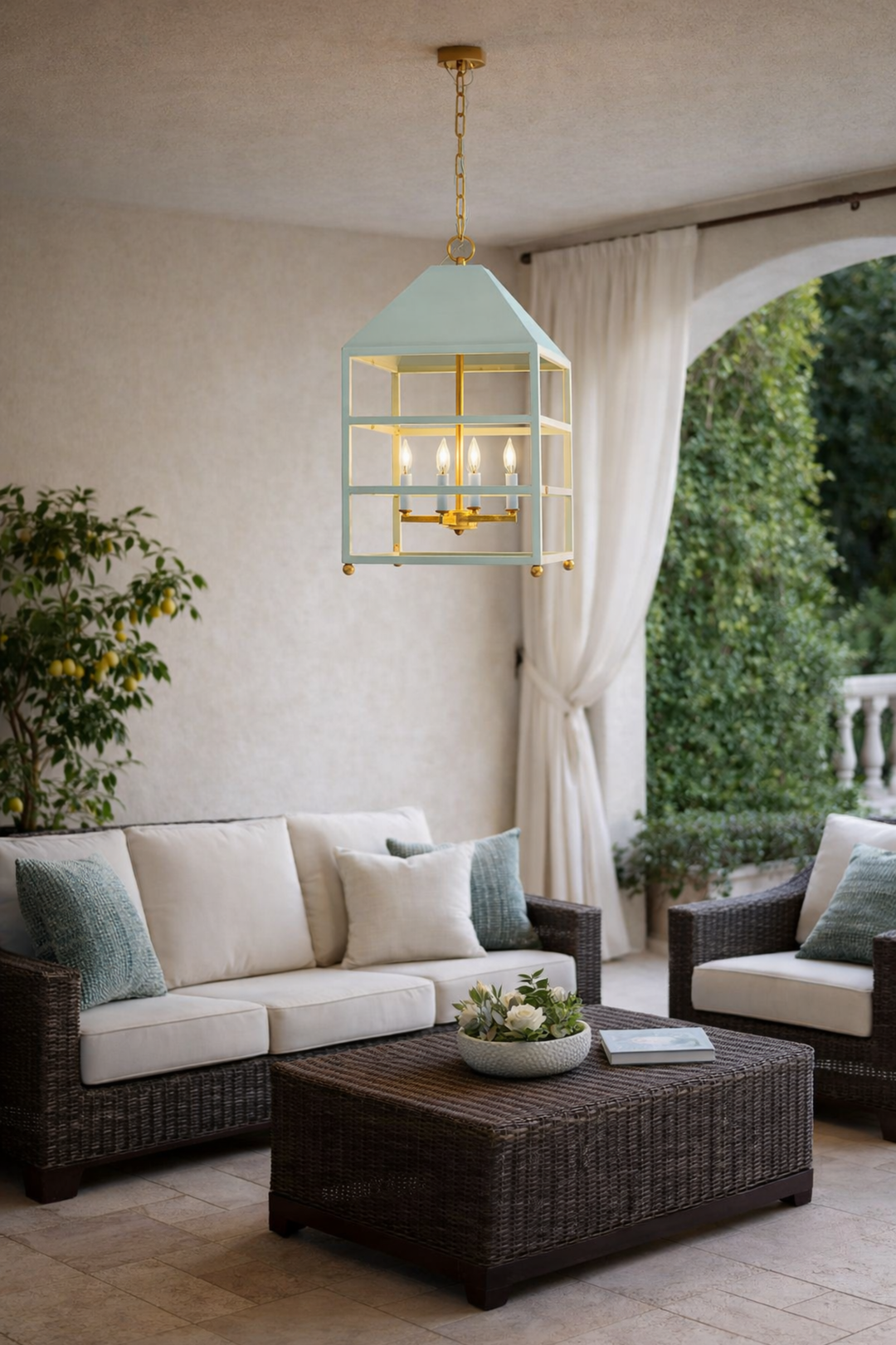 Outdoor patio with wicker furniture, hanging light fixture, and plants.