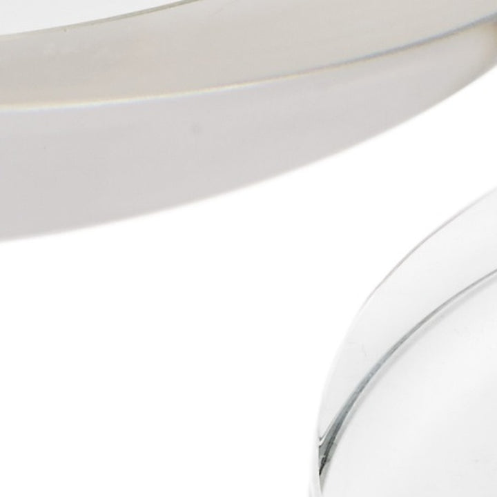 Clear round crystal riser set, close-up of layered edges and curved glass
