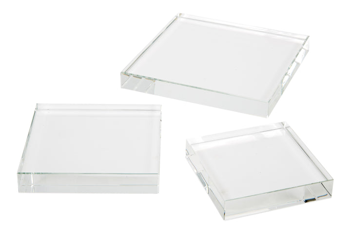 Set of 3 clear square crystal risers with flat tops and faceted edges
