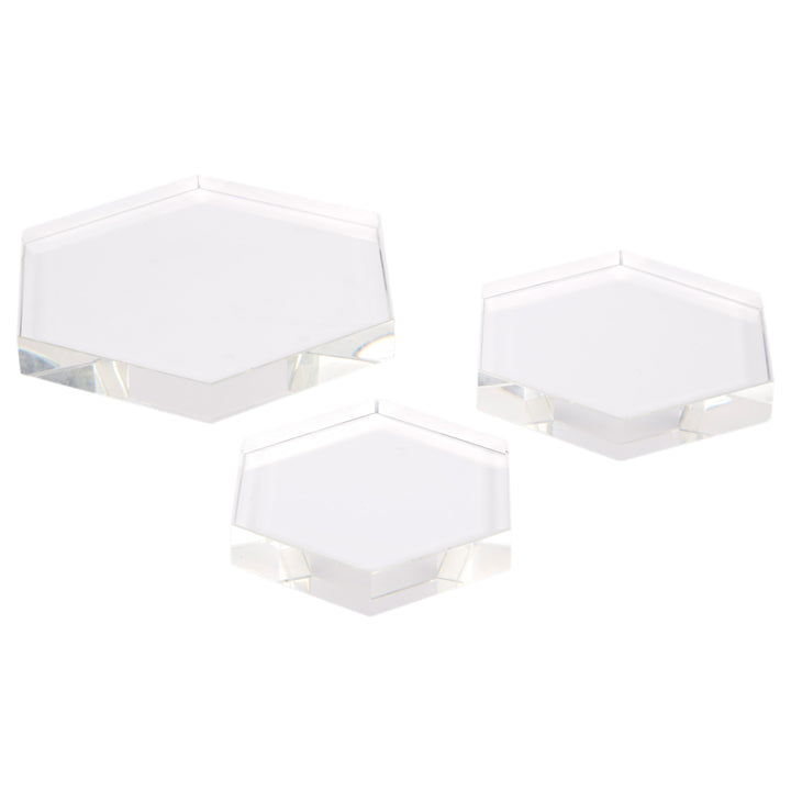 Set of 3 clear hexagonal crystal display risers with faceted sides