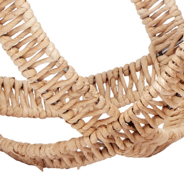 Rope-wrapped natural fiber decorative orb with braided cord ridges