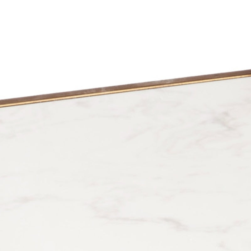 White marble tabletop with gold metal edge detail