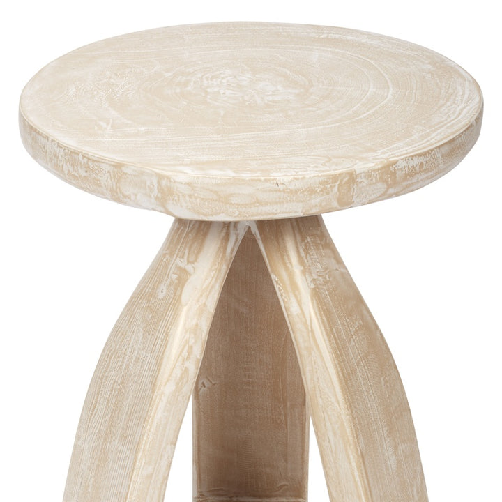 Round white pine accent table with turned legs and distressed light finish