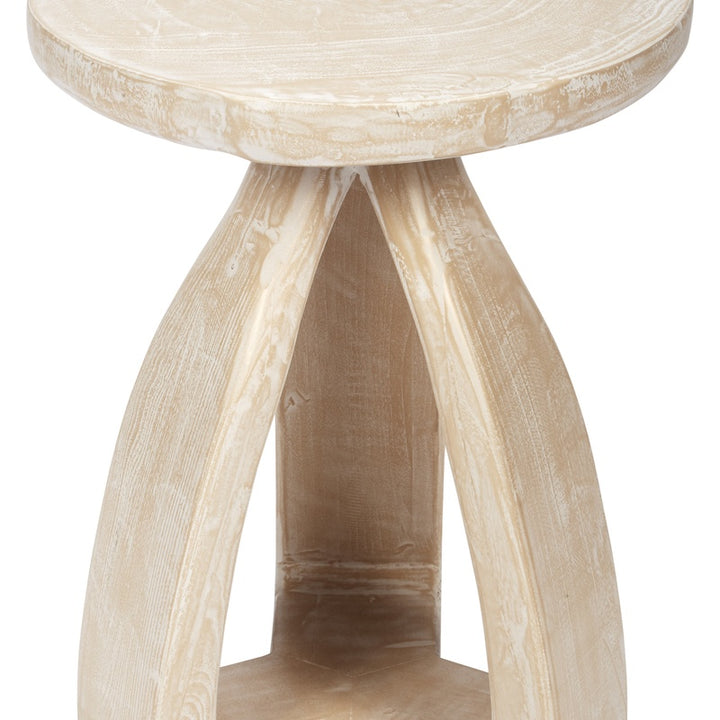 Round accent table with open pedestal legs in light distressed wood finish