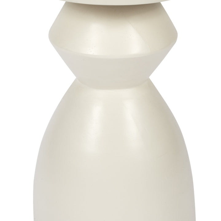 White pedestal accent table with sculpted column base underside