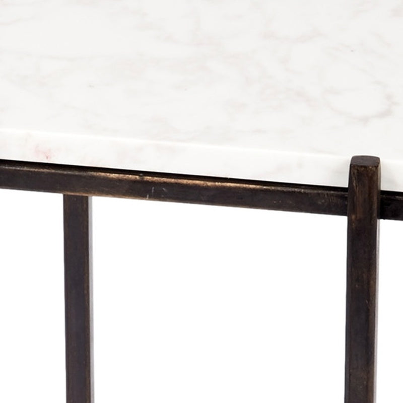 White marble tabletop with dark bronze edge and matching square leg support
