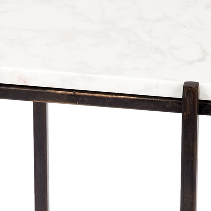 White marble tabletop with dark bronze edge and matching square leg support