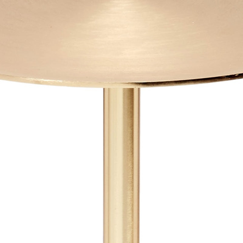 Osborn martini table top with gold pedestal support under round edge