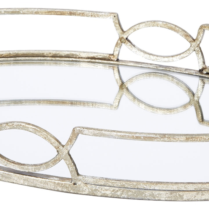Silver mirrored oval tray with two oval cutouts on metal frame