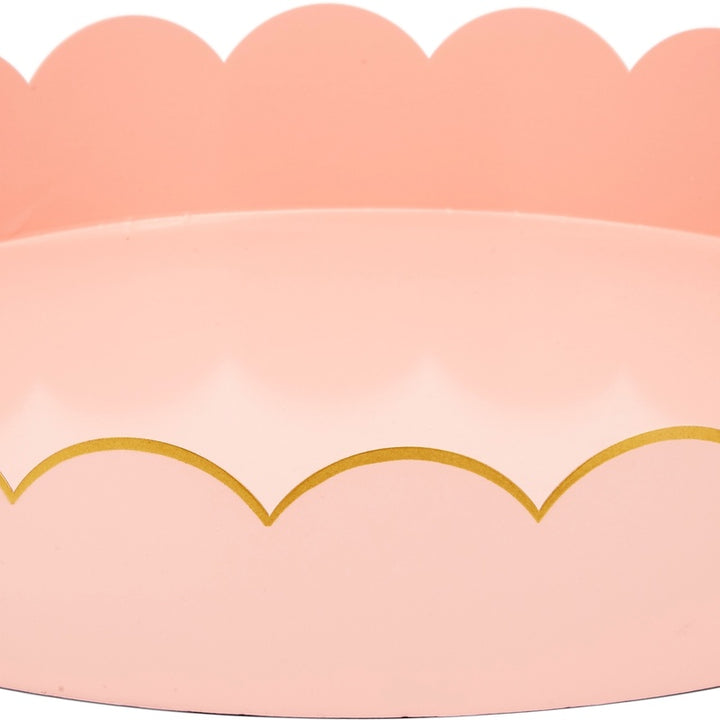 Blush metal tray interior with scalloped rim and gold trim
