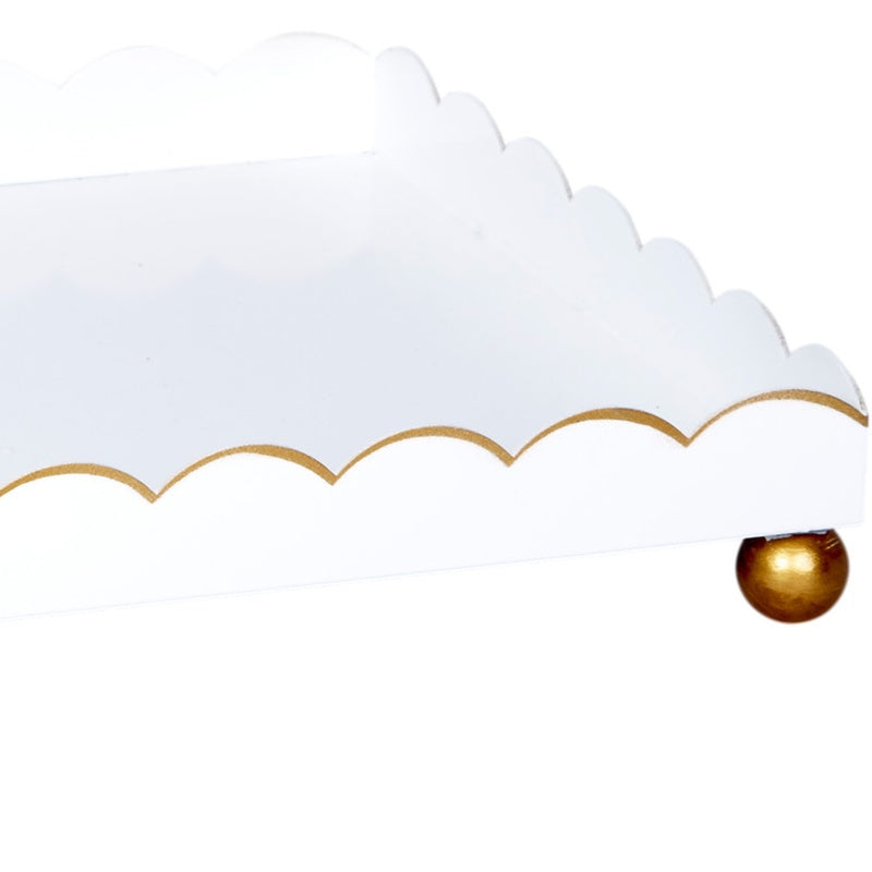 White rectangular metal tray with scalloped gold trim and gold corner ball foot