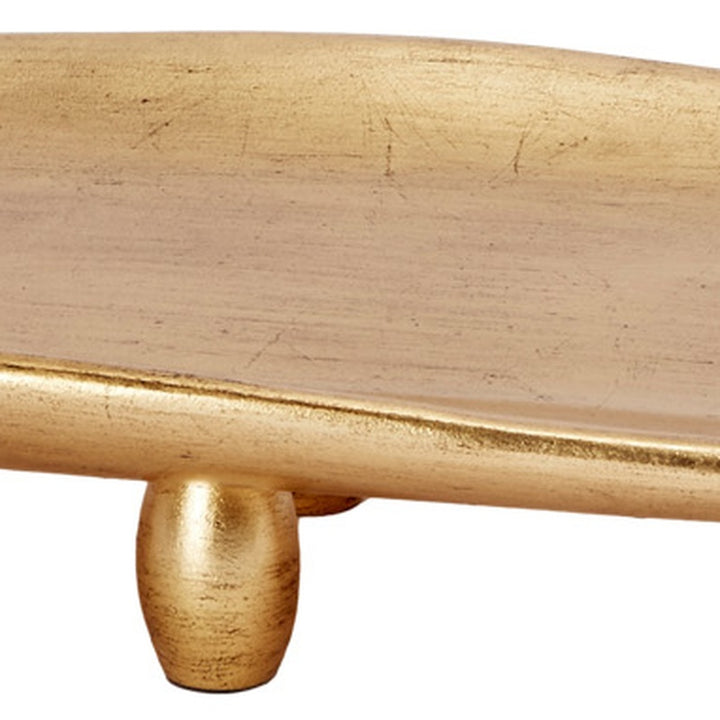 Antique gold display tray underside with central support foot