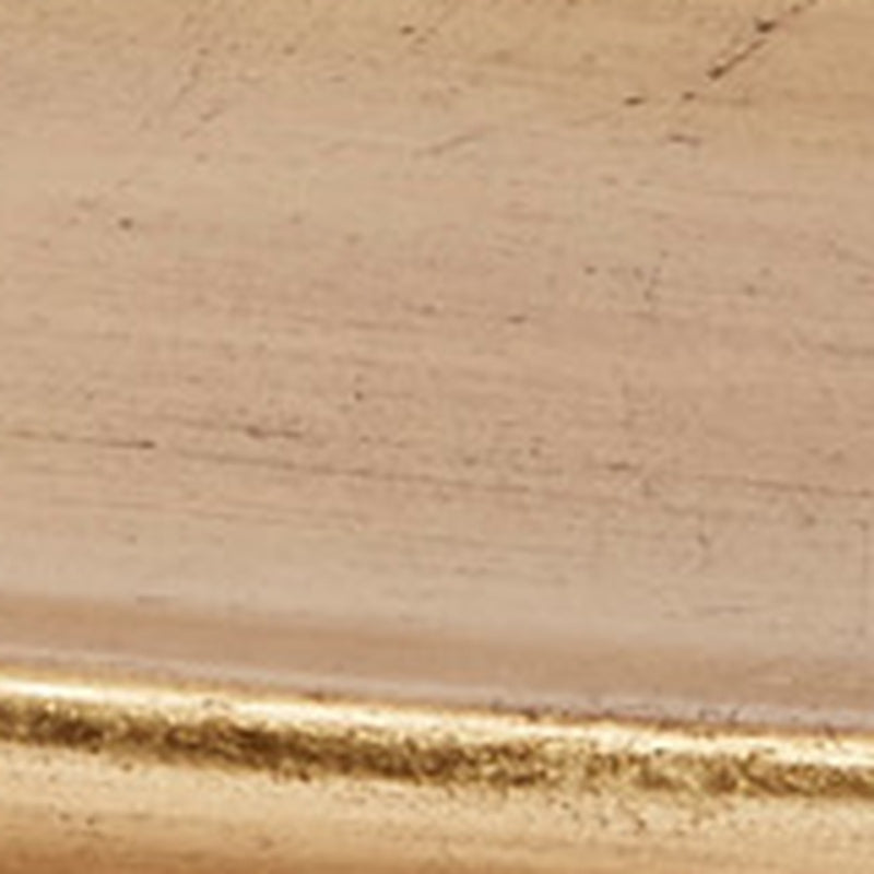 Antique gold display tray surface close-up with distressed patina