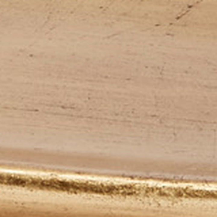 Antique gold display tray surface close-up with distressed patina