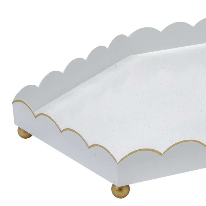 Glossy white six-sided metal tray with gold scalloped rim and corner trim