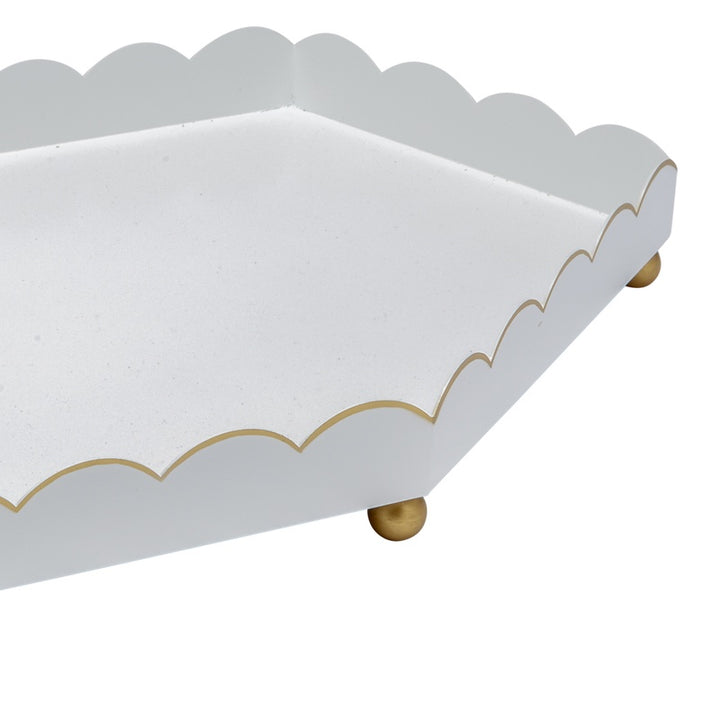 Glossy white six-sided metal tray with gold scalloped sides and round feet