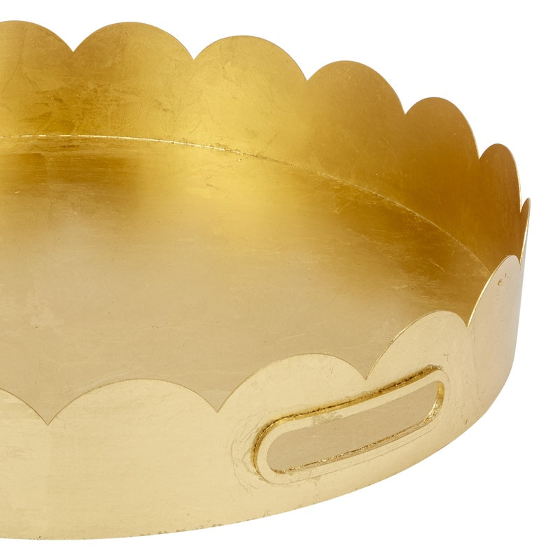 Gold scalloped metal tray edge with oval handle cutout, shallow bowl shape