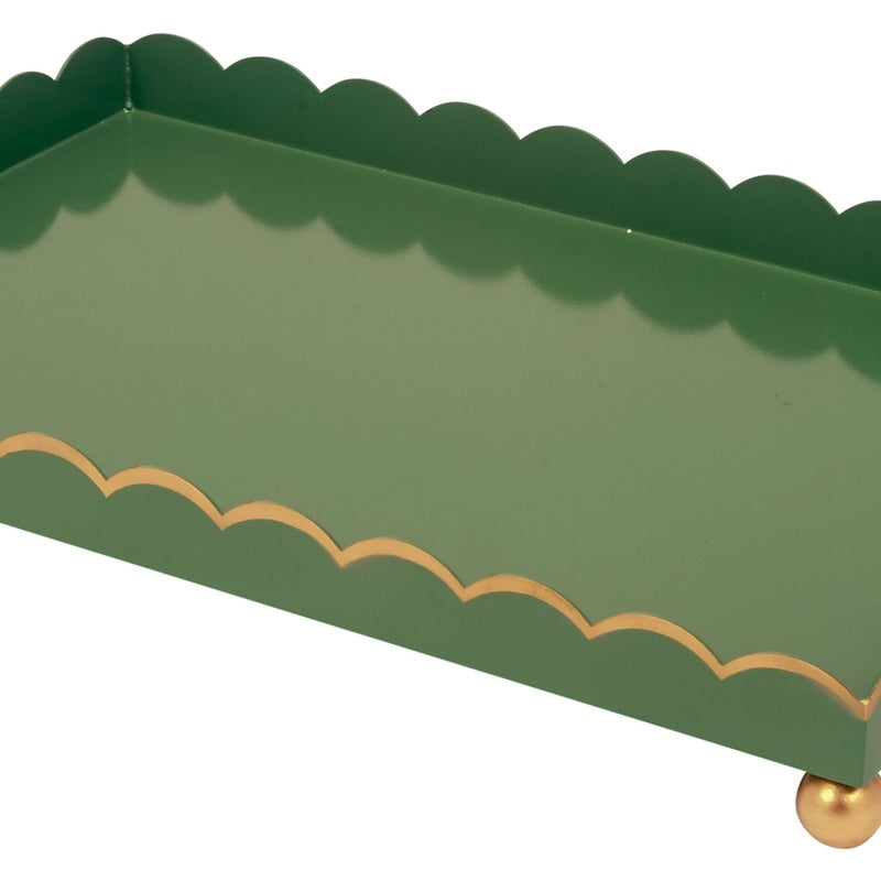 Rectangular green tray with scalloped rim and gold wave trim; brass corner feet.