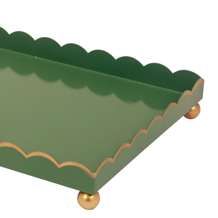 Rectangular green serving tray with gold edging, scalloped sides, and brass corner legs.