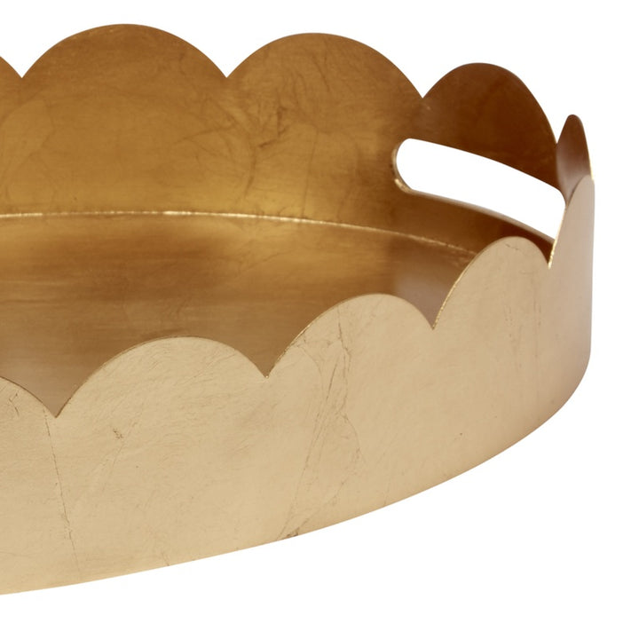 Gold oval tray corner with raised rim, scalloped edge and cutout handle loop.