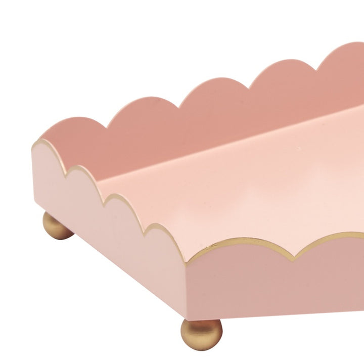 Pink scalloped metal tray with gold rim and gold feet
