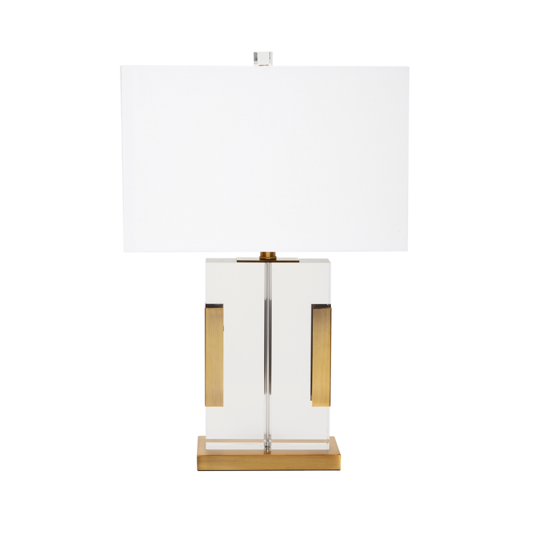Modern luxury table lamp with clear acrylic body, gold metal accents, rectangular white fabric shade, contemporary decorative lighting for living rooms, bedrooms, and upscale interior décor.