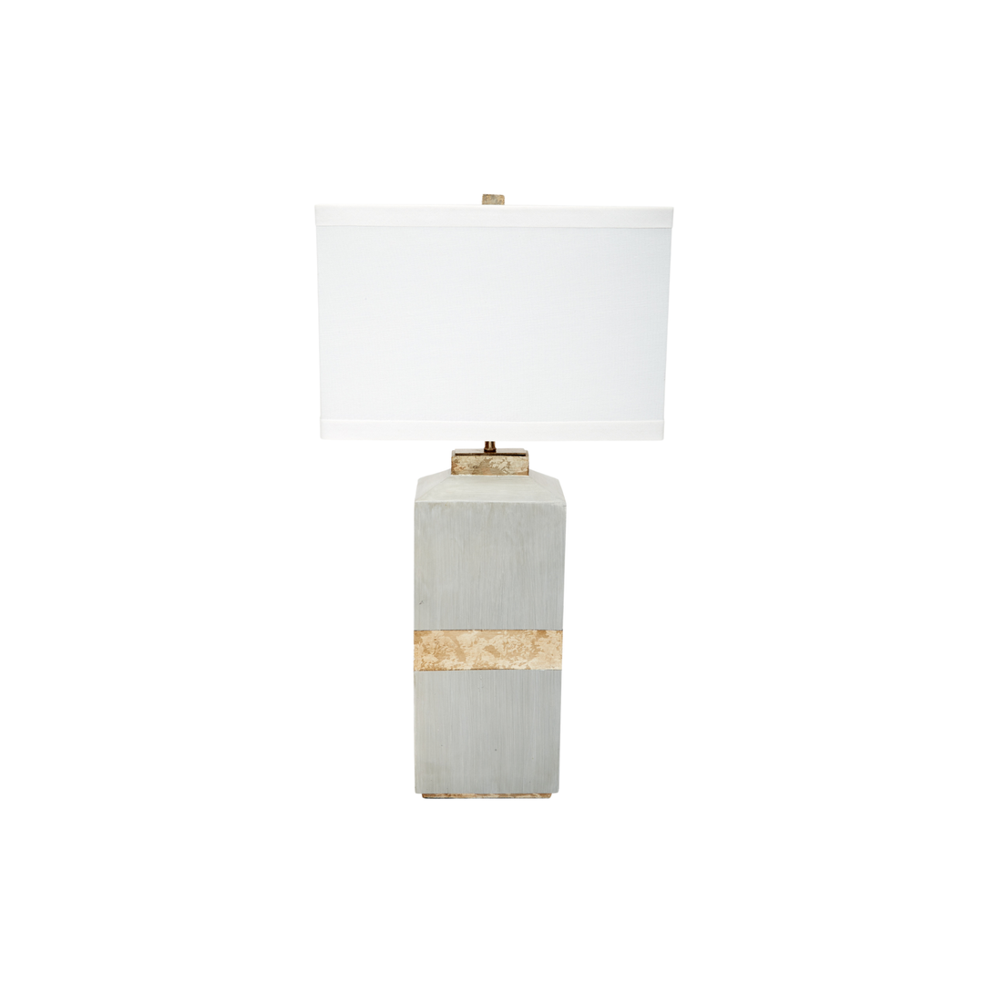 Modern rectangular table lamp with textured grey stone-inspired base, gold accent band, and wide white fabric shade, contemporary luxury lighting for living rooms, bedrooms, and upscale interior décor.