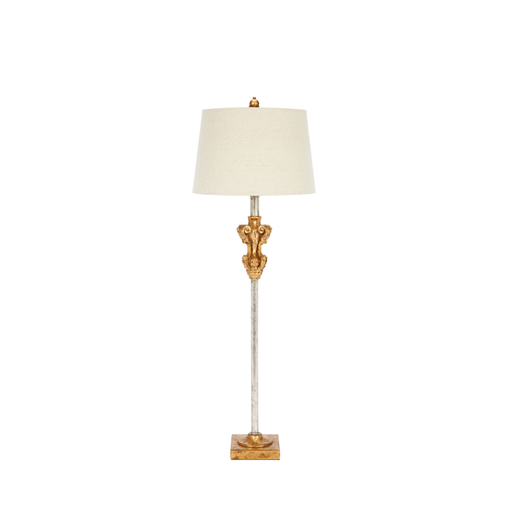 Elegant tall decorative table lamp with antique gold ornamental accent, slim distressed metallic body, square gold base, and cream fabric shade, vintage luxury lighting for formal living rooms, entryways, and classic interior décor.