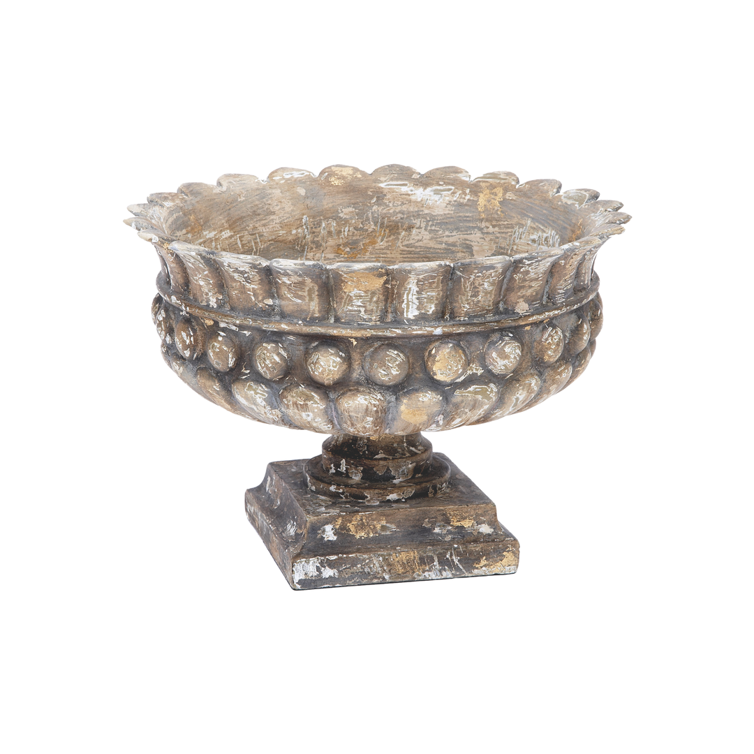 Distressed antique-style decorative pedestal bowl with textured carved detailing and weathered finish on white background