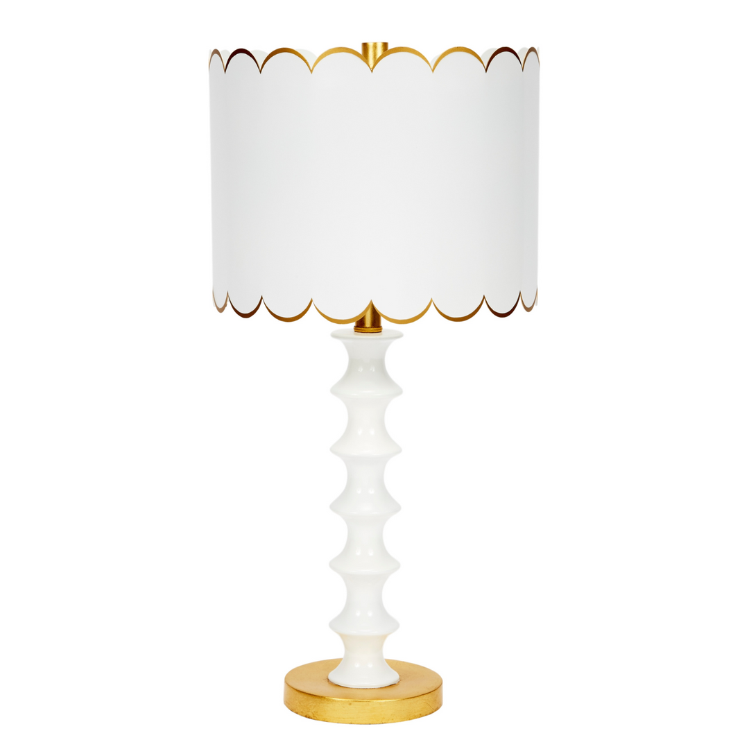 Eloise white table lamp with a luxurious gold scalloped shade, perfect for adding a touch of elegance to bedrooms, living rooms, or offices.