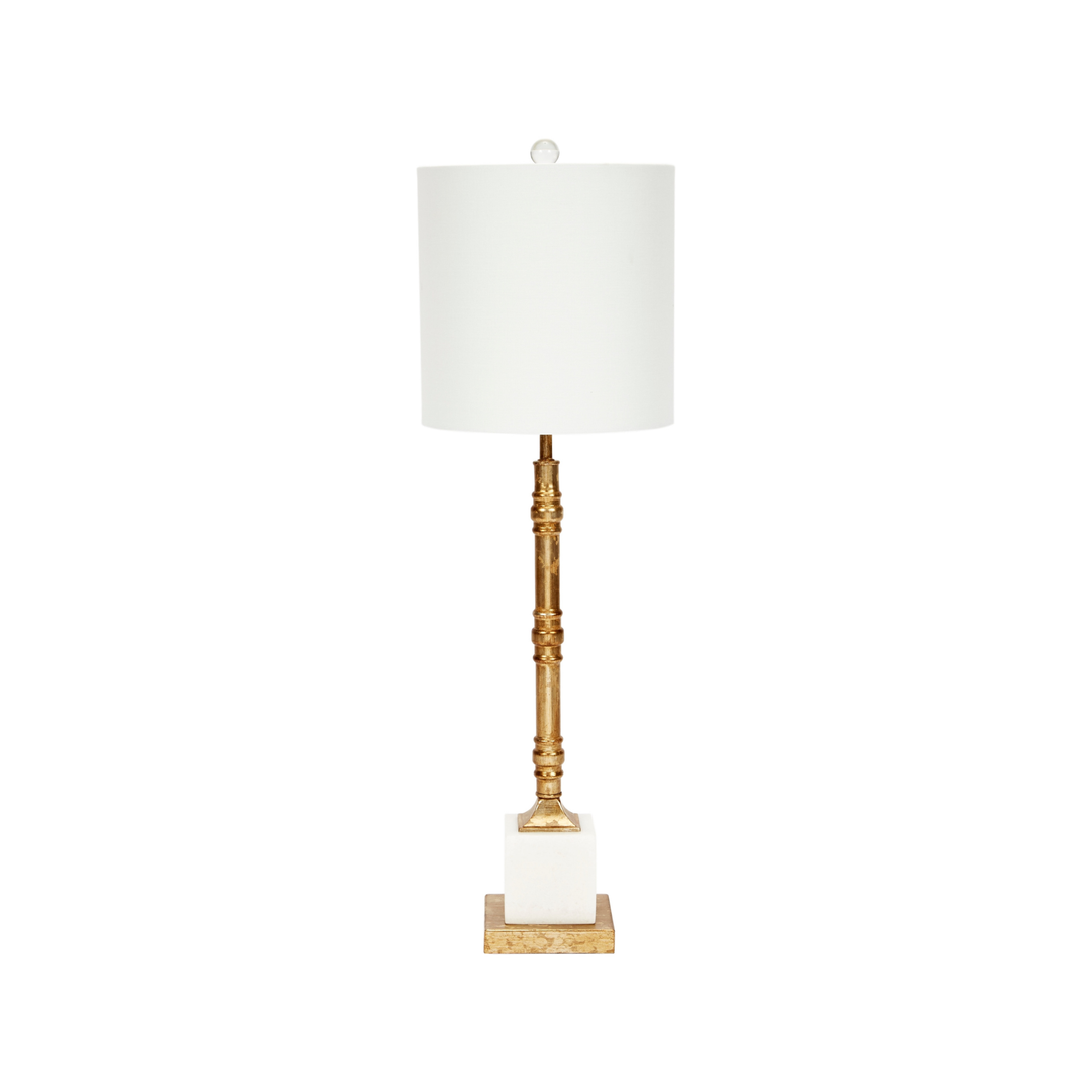 Carson aged gold table lamp with a luxurious marble base and crisp white linen shade, perfect for adding elegance to modern interiors.