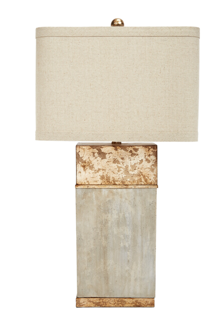 Alan square lamp with a bold cement base and antique gold accents, offering a contemporary and chic style for any space.
