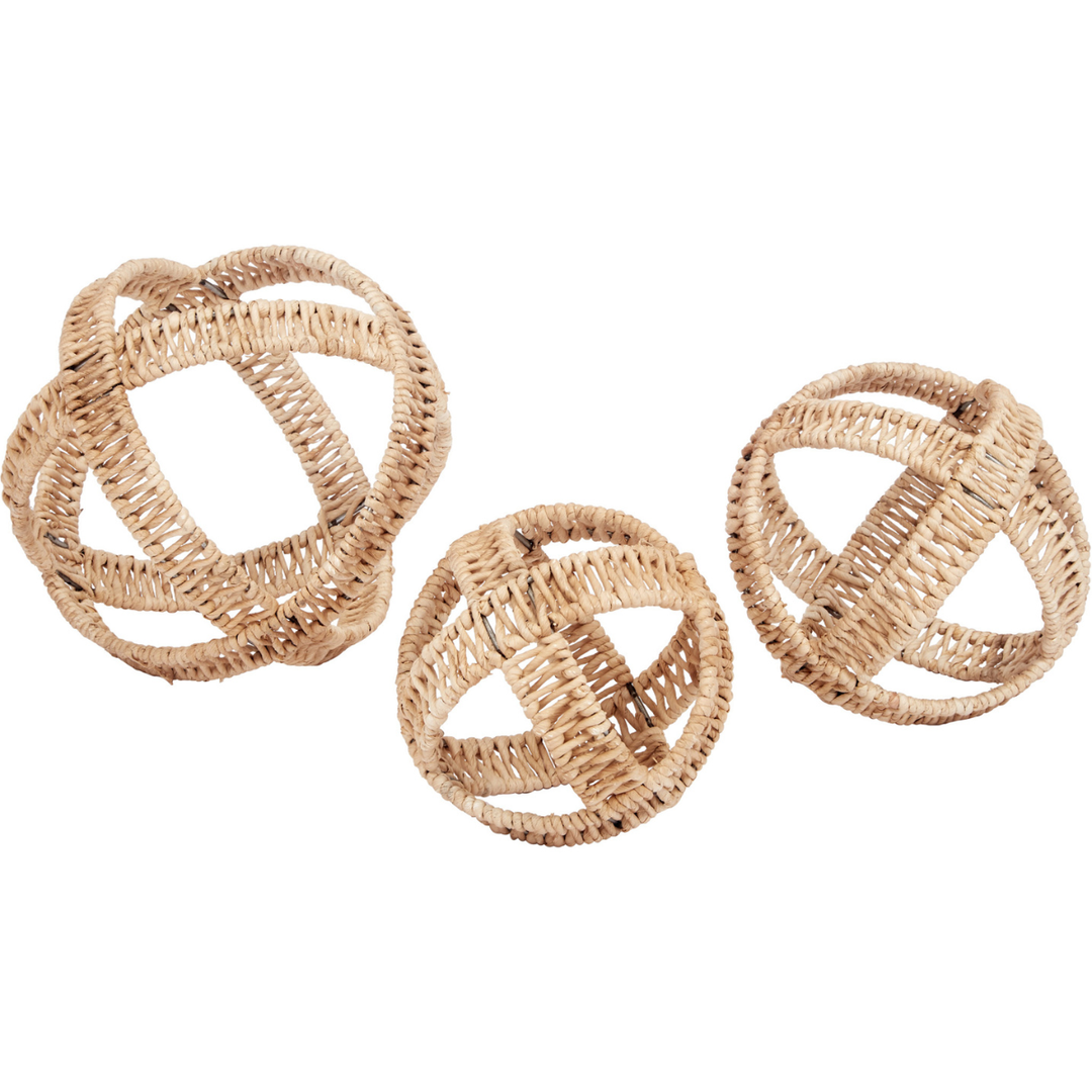 Set of three woven rattan decorative orb balls, natural rustic tabletop accent spheres for boho home decor styling.