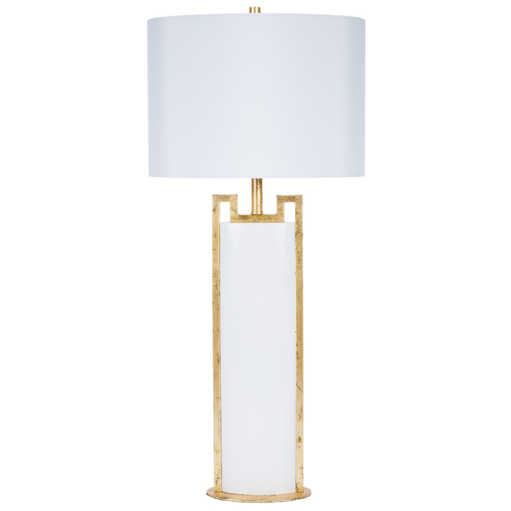 Modern tall table lamp with white cylindrical body, brushed gold geometric frame accents, and a white drum shade, luxury contemporary lighting décor for living rooms, bedrooms, and upscale interior spaces.