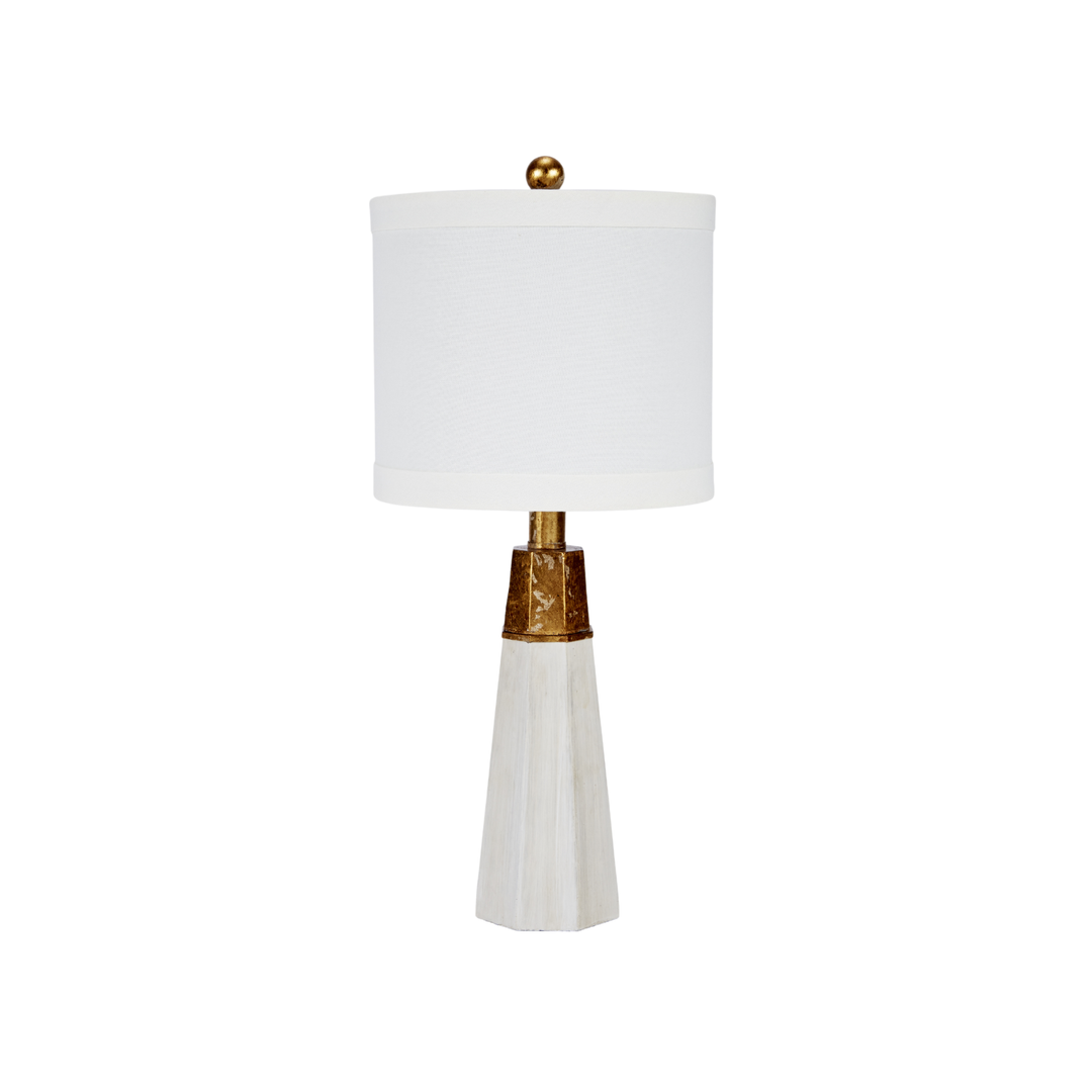 Modern white table lamp with cylindrical fabric shade, gold accent detailing, and tapered marble-style base, luxury home decor lighting on white background