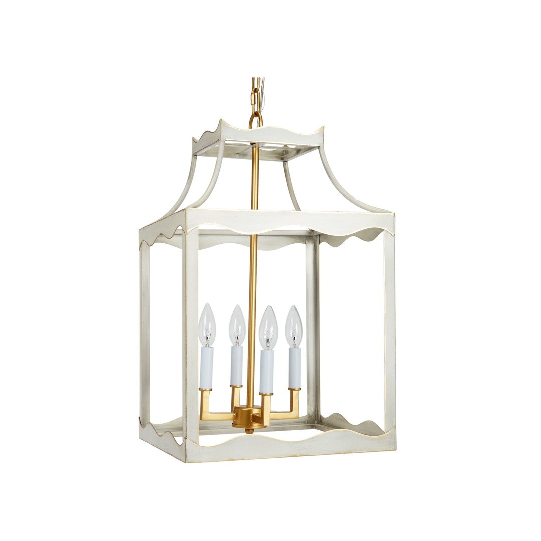 Stylish metal lantern featuring gold accents, perfect for adding charm to living rooms, entryways, or outdoor spaces.
