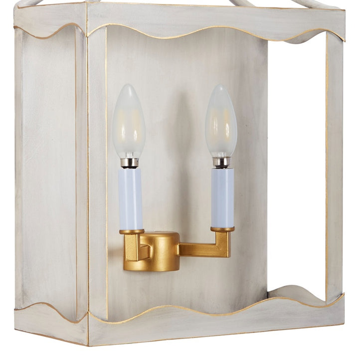 Cream and gold metal wall sconce, two-bulb design with gold backing plate