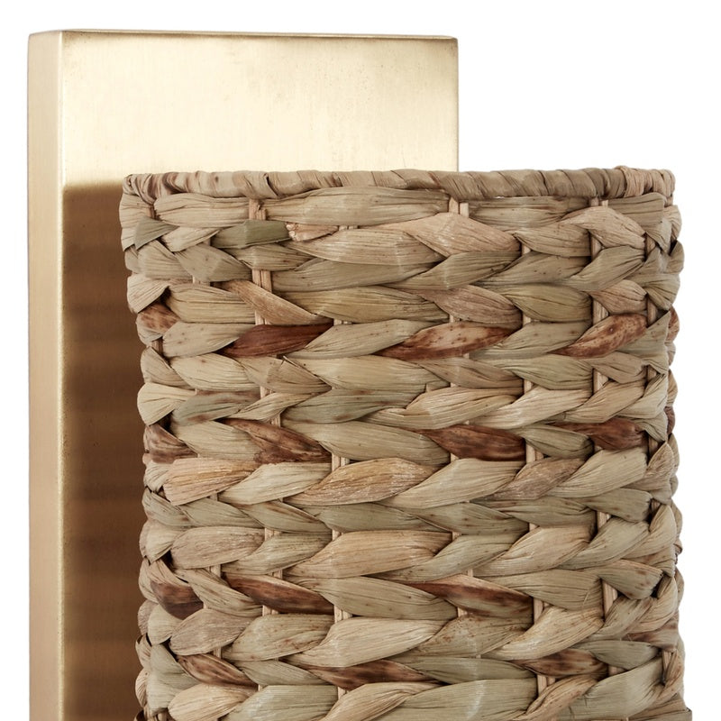 Gold wall sconce with woven water hyacinth shade and rectangular backplate