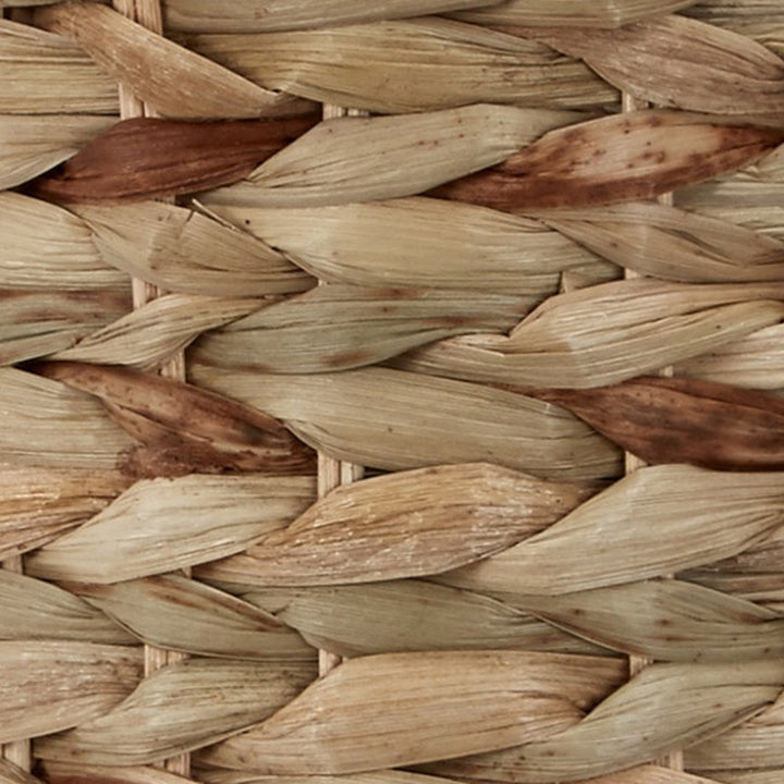 Woven water hyacinth shade texture with natural beige and brown strands